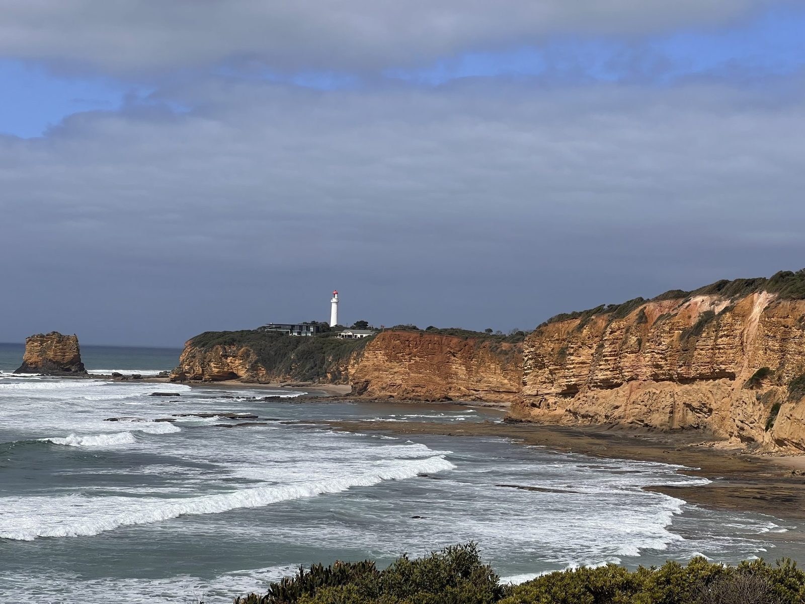 Cliffs and lighthouse along the Great Ocean Road